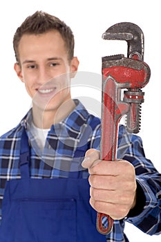 Plumber holding pipe wrench