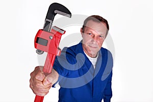 Plumber holding wrench