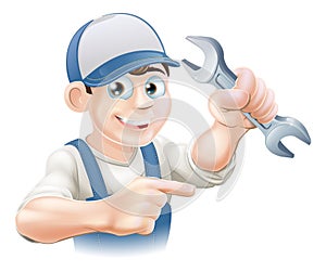 Plumber or mechanic pointing photo
