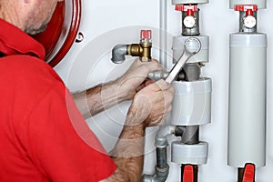 Plumber with metal wrench