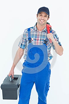 Plumber with monkey wrench and tool box