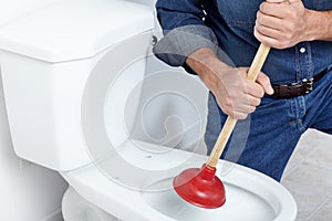 Plumber with a plunger