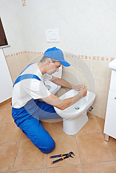 plumber service. handyman installing or repair toilet sink