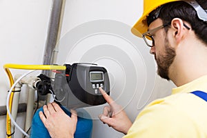 Plumber set up water filtration system photo