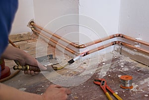 Plumber soldering img