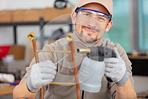 plumber soldering copper pipe