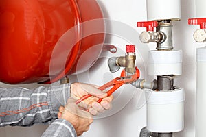 Plumber with tool in hand