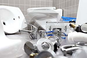plumber tools and equipment in a bathroom, plumbing repair service, assemble and install concept