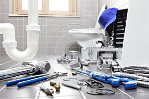 plumber tools and equipment in a bathroom, plumbing repair service, assemble and install concept