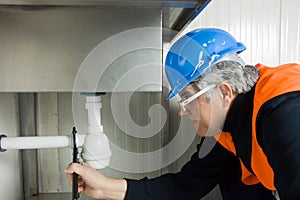 Plumber at work