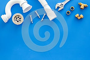 Plumber work with instruments, tools and gear on blue background top view mock up