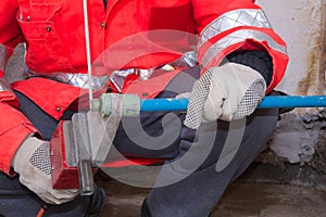 Plumber at work in a site