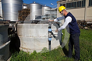 Plumber at work in a site