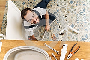 Plumber work in uniform indoors