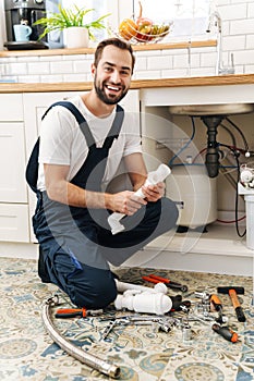 Plumber work in uniform indoors