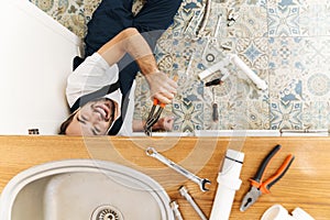 Plumber work in uniform indoors