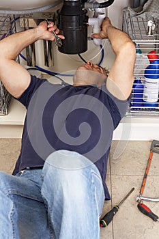 Plumber Working On Sink