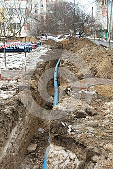 Plumbing pipe laying. Plastic polypropylene pipe. Sanitary, sewer drainage system for a multi-story building. Civil infrastructure