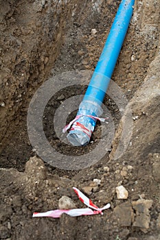 Plumbing pipe laying. Plastic polypropylene pipe. Sanitary, sewer drainage system for a multi-story building. Civil infrastructure