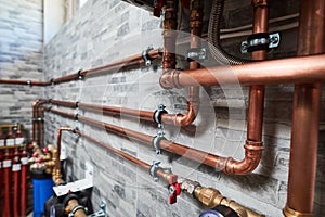 Plumbing service. copper pipeline of a heating system in boiler room