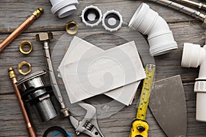 Plumbing tools and tiles. Home improvement background