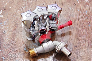 Plumbing water valves with tap