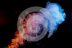 A Plume of Blue, Red, and Yellow Smoke Overlaid on a Black Background