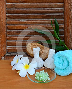 Plumeria flowers and spa accessories.