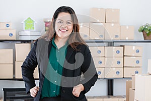 Plump lady in startup office