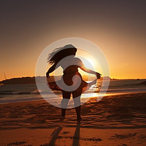 Plump woman dancing on beach photo
