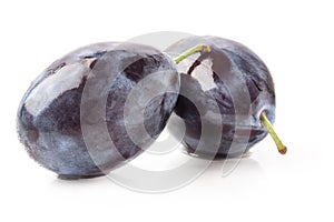 Plums isolated on white