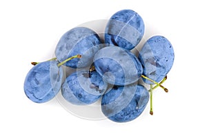 Plums isolated on a white background. Top view. Flat lay pattern