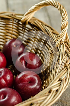 Plums in a Picnic Basket