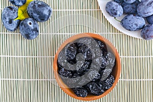 Plums `prunes` dried plums on white background