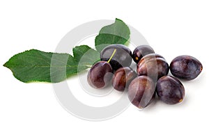 Plums on a white background.