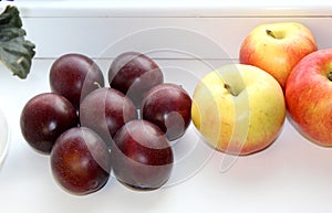 plums on white background