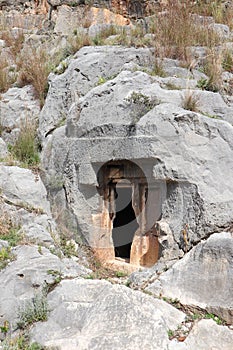 Plundered ancient lycian tombs of Myra near Demre, Turkey close up view