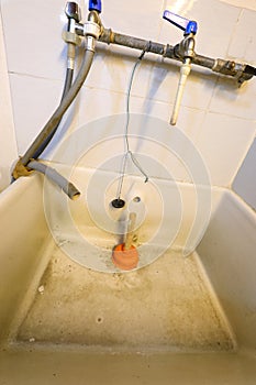 plunger in the washbasin