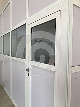 Plus size aluminum glazed partitions for an temporary office and installed by an experienced technician for an warehouse