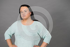 Plus size mature woman in jumper