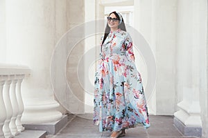 Plus size model in floral dress