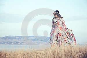 Plus size model in floral dress photo