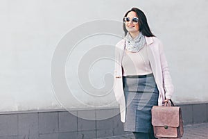 Plus size model in pink coat