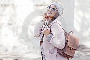 Plus size model in pink coat