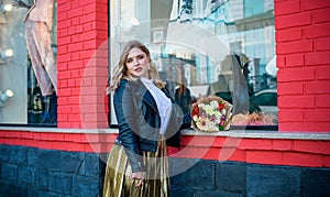 Plus size nice woman in suit at street, spring trends