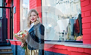 Plus size nice woman in suit at street, spring trends