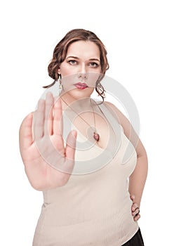 Plus size woman making stop gesture