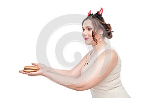 Plus size woman seducing with hamburger