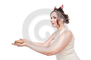 Plus size woman seducing with hamburger photo