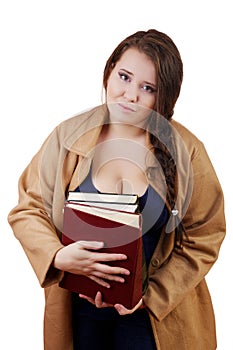 Plus size woman with thick volumes of books